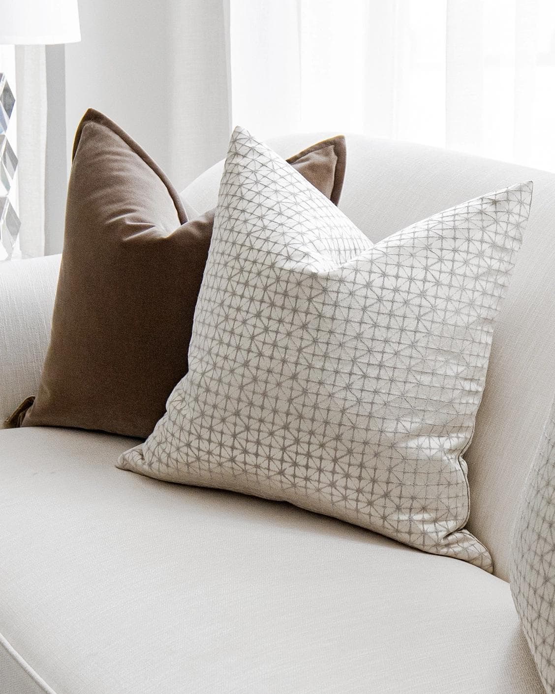 Farah Bundle cushion in brown and silver, shown in a lifestyle right view as image 5