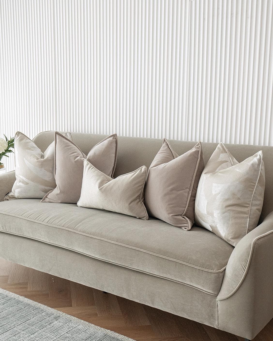 Spencer Bundle cushion in beige and silver, shown in a lifestyle right view as image 4