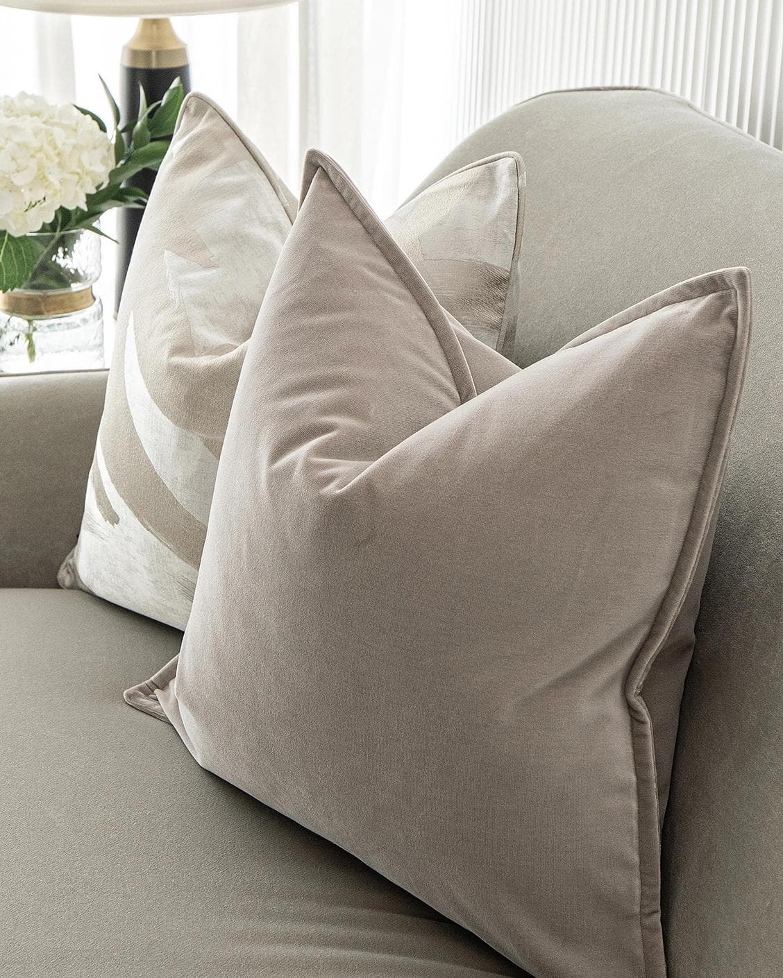 Spencer Bundle cushion in beige and silver, shown in a lifestyle right view as image 5