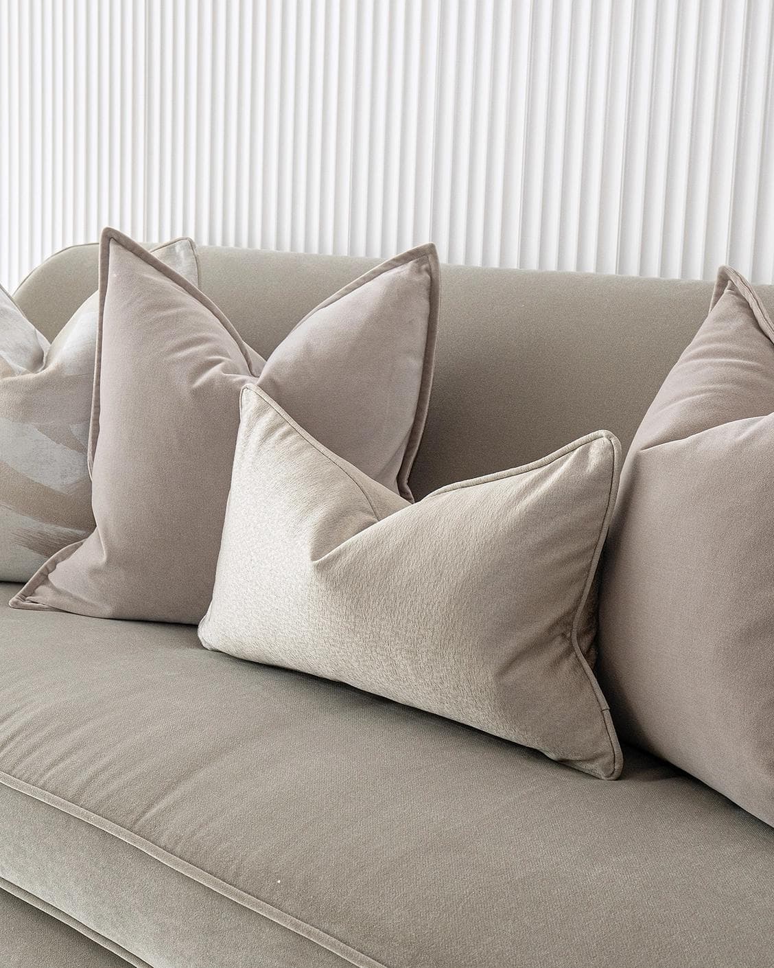 Spencer Bundle cushion in beige and silver, shown in a product right view as image 6