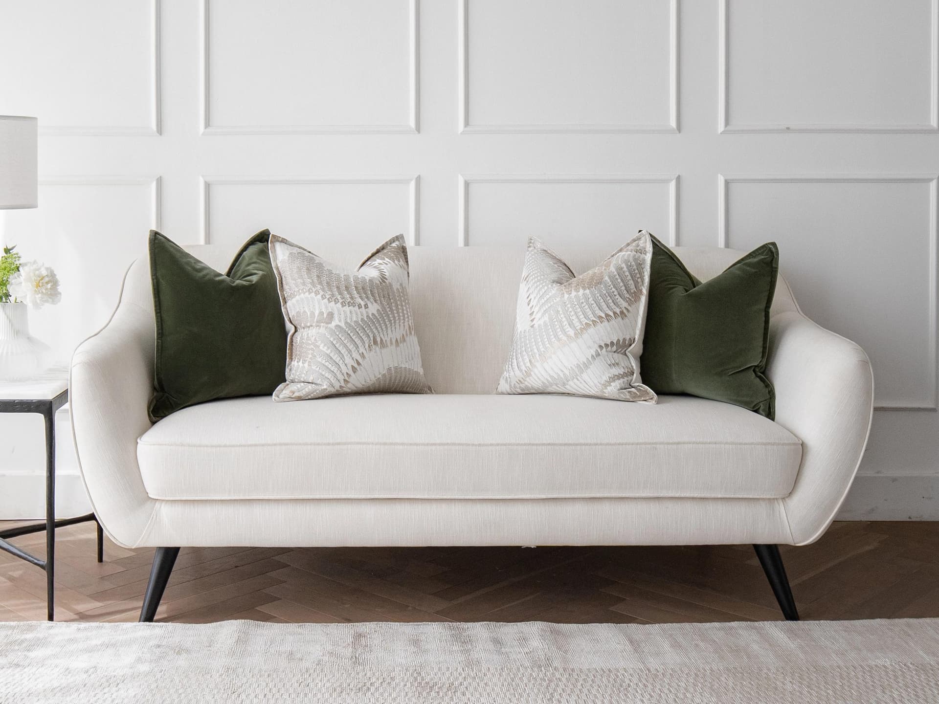 Grace Bundle cushion in green, brown and grey, shown in a lifestyle front view as image 6