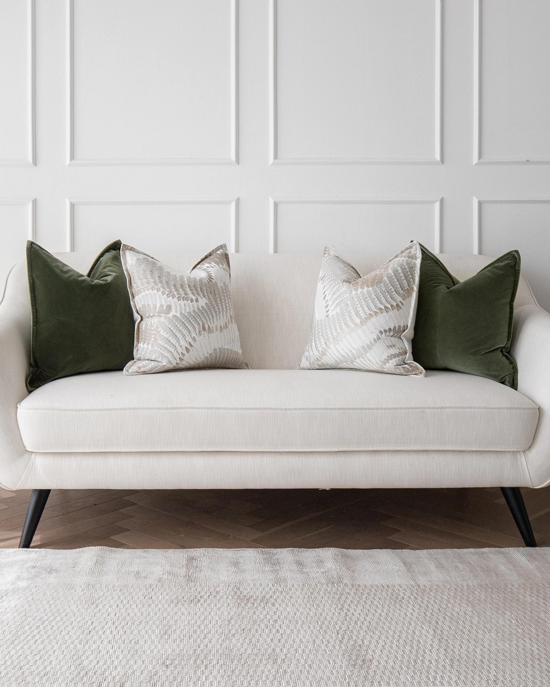 Grace Bundle cushion in green, brown and grey, shown in a lifestyle front view as image 6