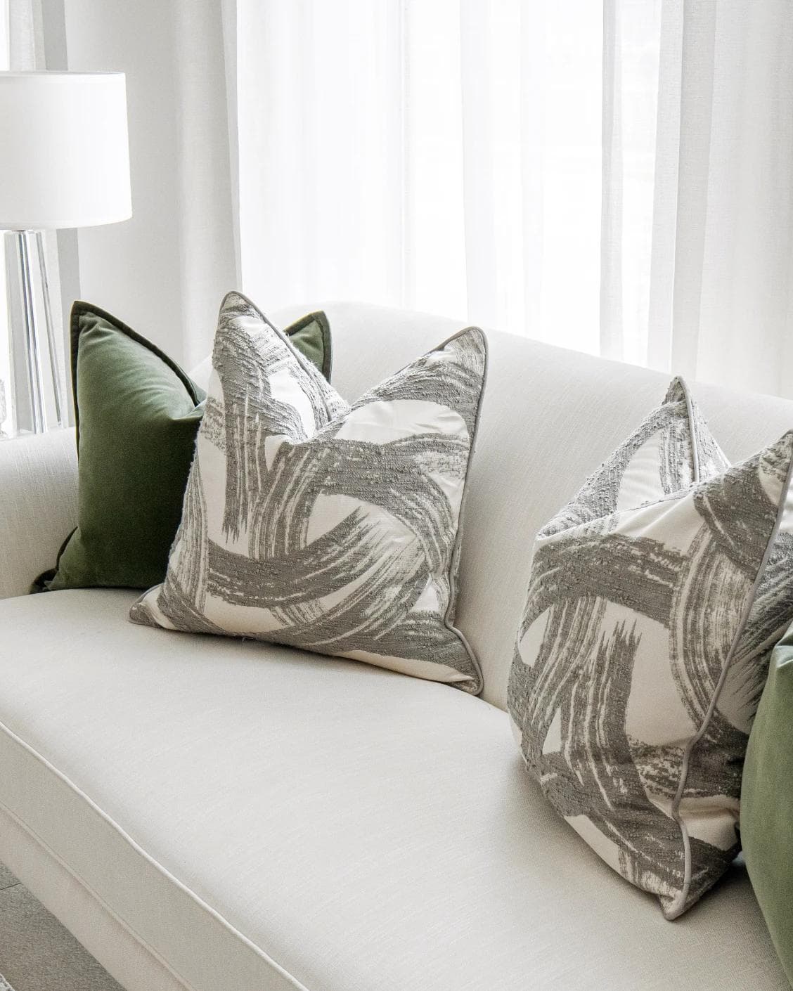 Cattleya Bundle cushion in green, white and grey, shown in a lifestyle right view as image 5