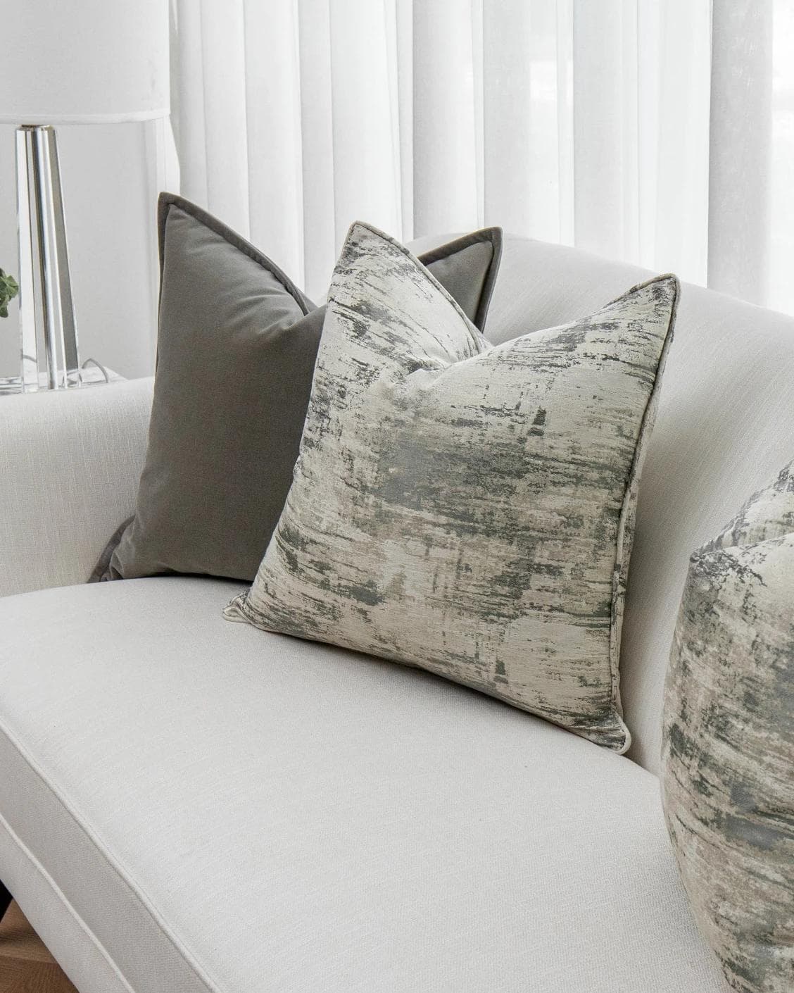 Mylene Bundle cushion in grey and white, shown in a product right view as image 5