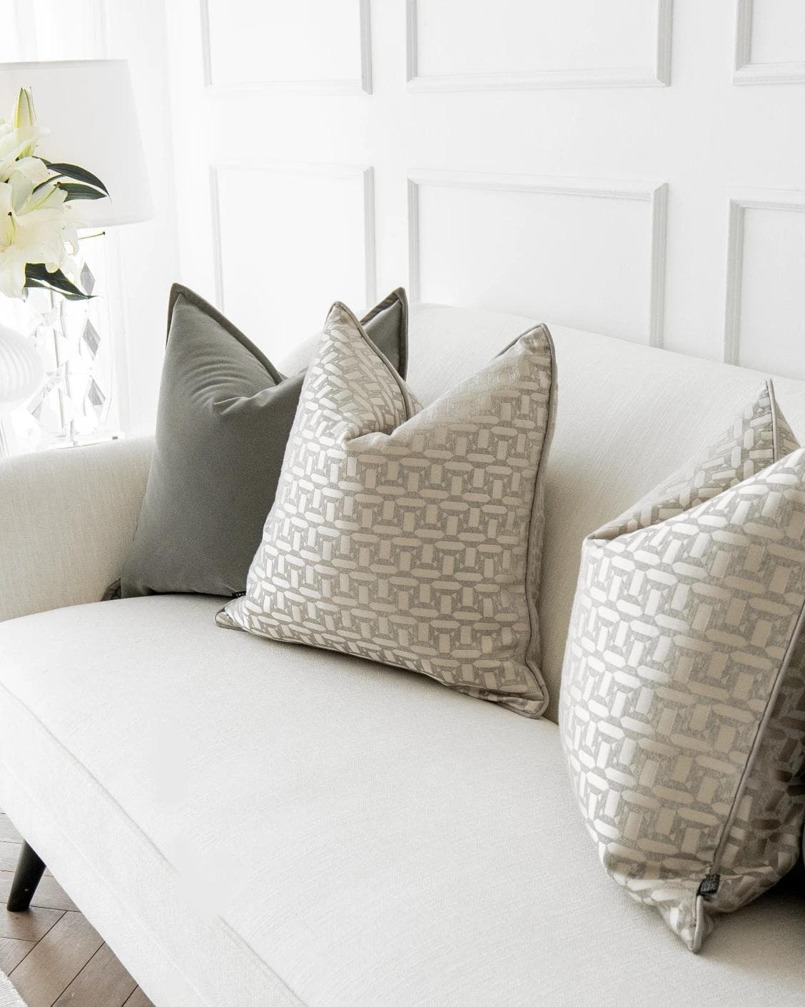 Amara Bundle cushion in grey, beige and silver, shown in a lifestyle right view as image 5