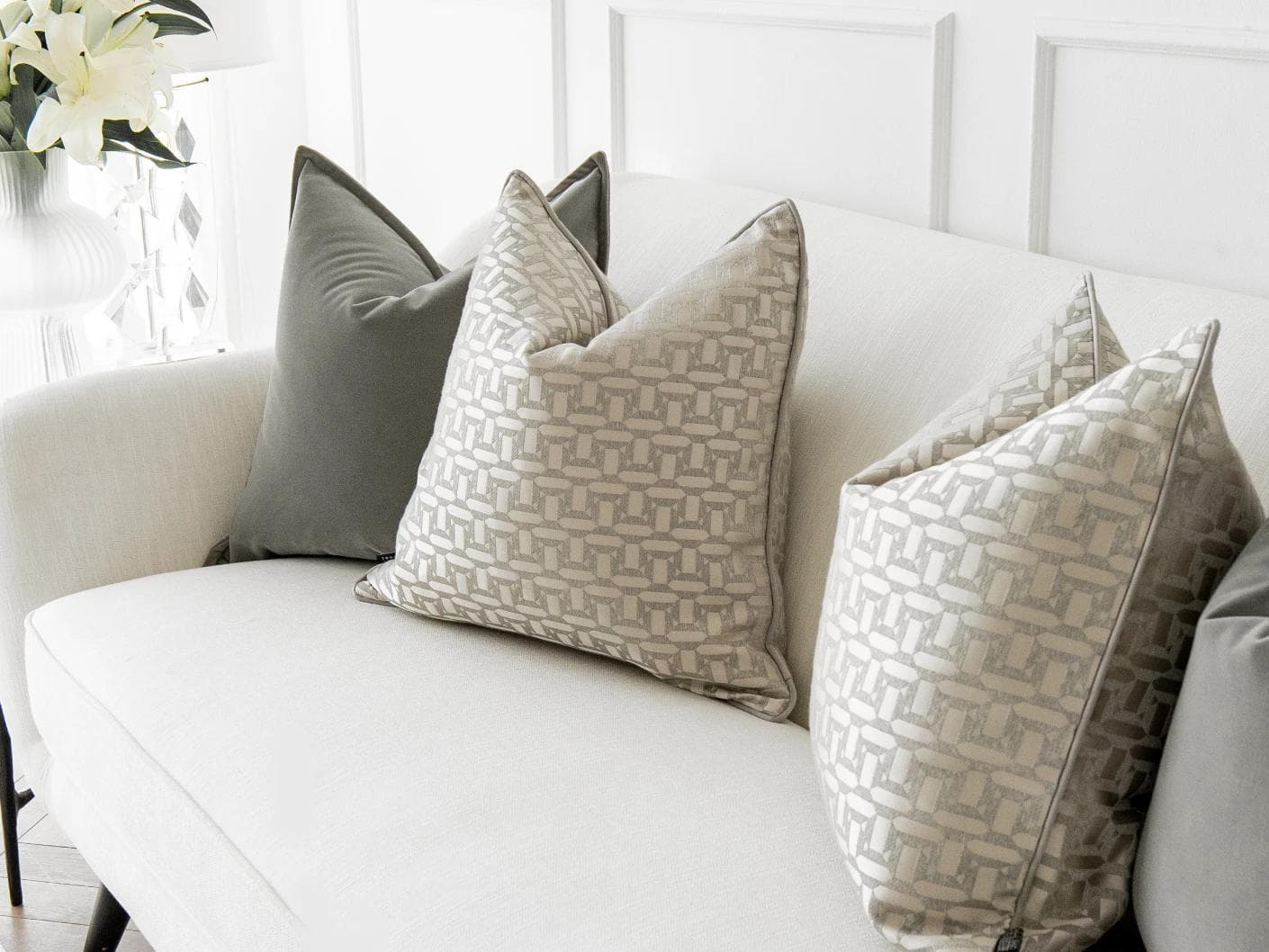 Amara Bundle cushion in grey, beige and silver, shown in a lifestyle right view as image 5