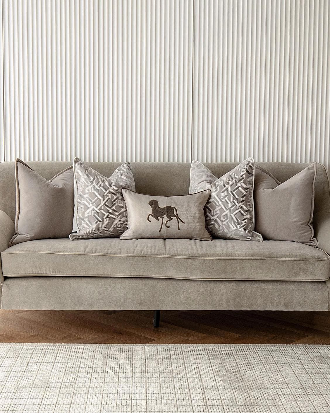 Sherwin Bundle cushion in beige, white and brown, shown in a lifestyle front view as image 4