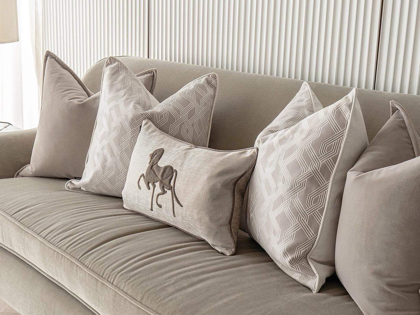 Sherwin Bundle cushion in beige, white and brown, shown in a product right view as image 5