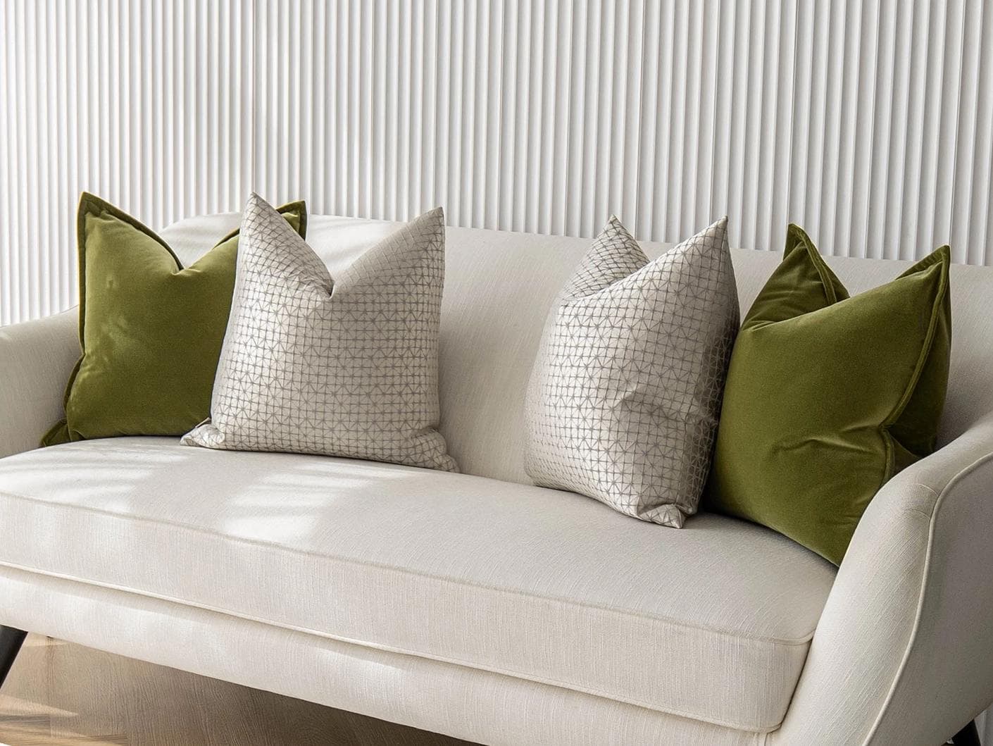 Otto Bundle cushion in silver, green and white, shown in a lifestyle right view as image 2