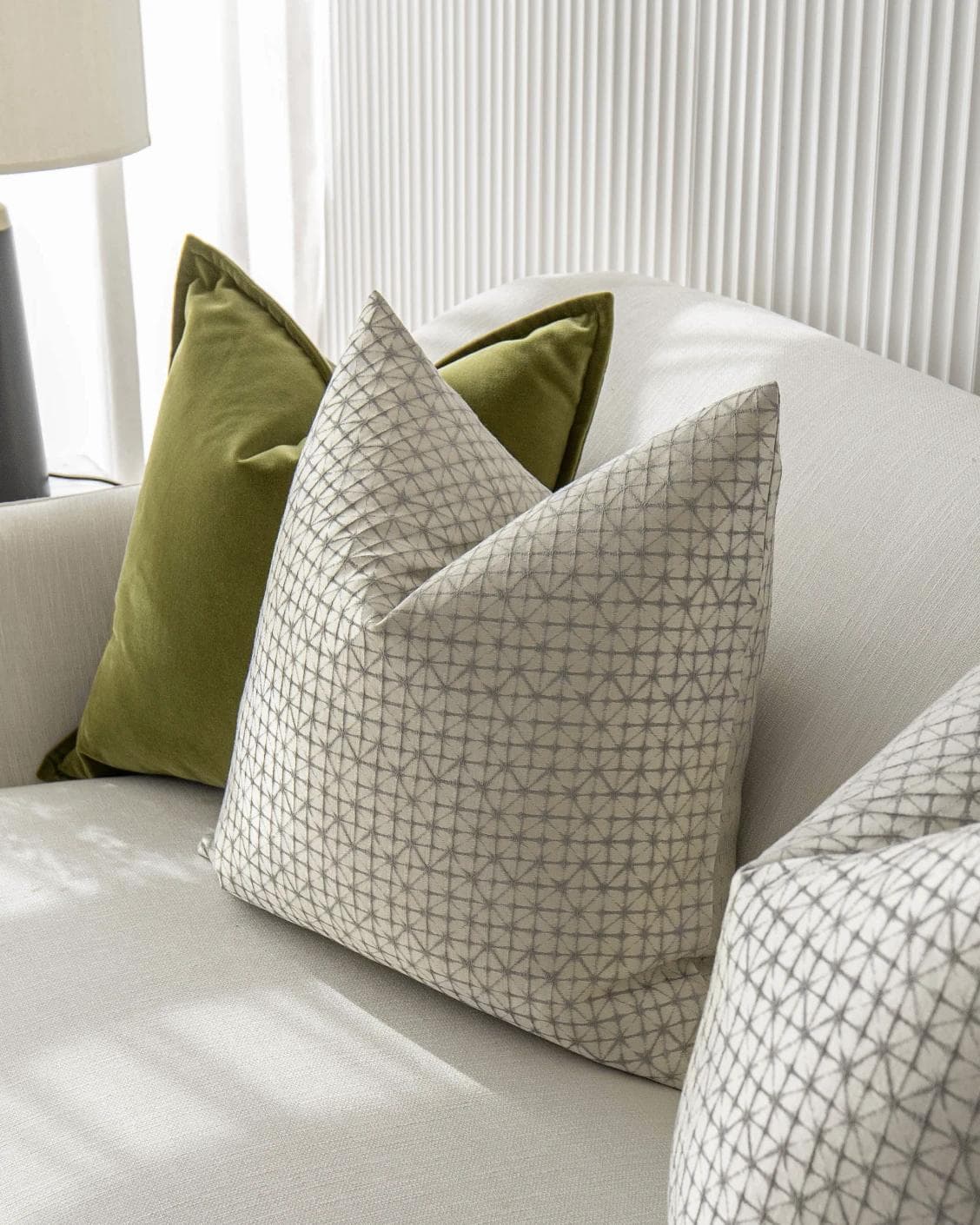 Otto Bundle cushion in silver, green and white, shown in a product right view as image 5