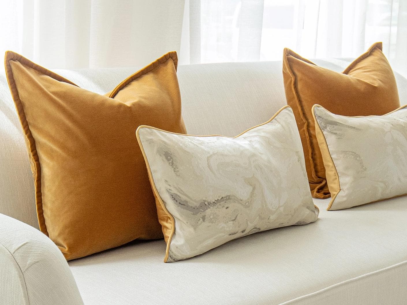 Johan Bundle cushion in orange, silver and yellow, shown in a product left view as image 5
