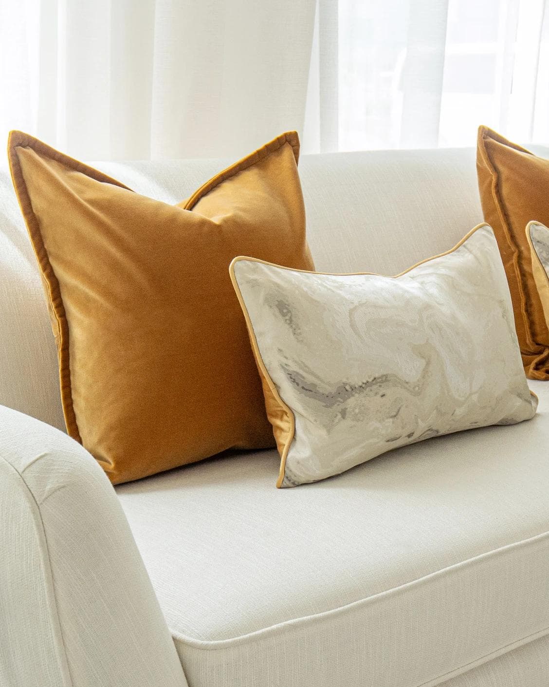 Johan Bundle cushion in orange, silver and yellow, shown in a product left view as image 5