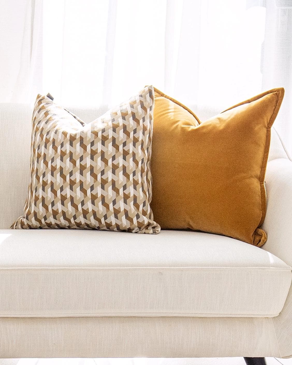 Phoebe Bundle cushion in orange, shown in a product front view as image 5