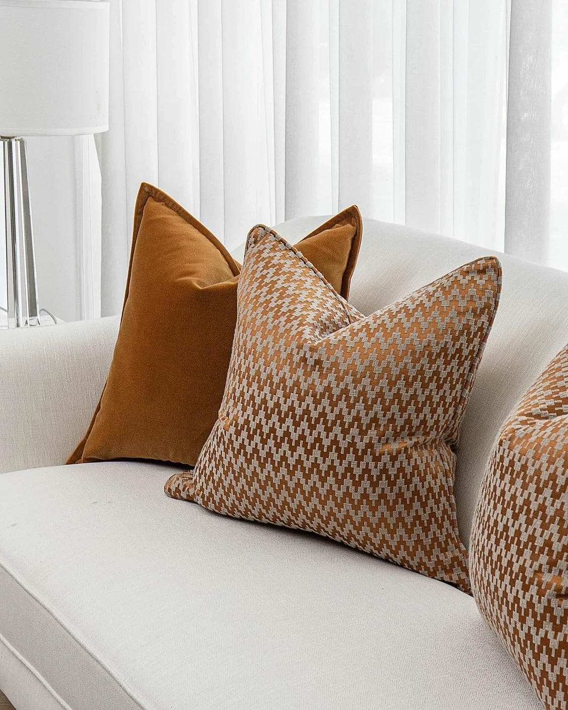 Cleopatra Bundle cushion in orange, shown in a product right view as image 5