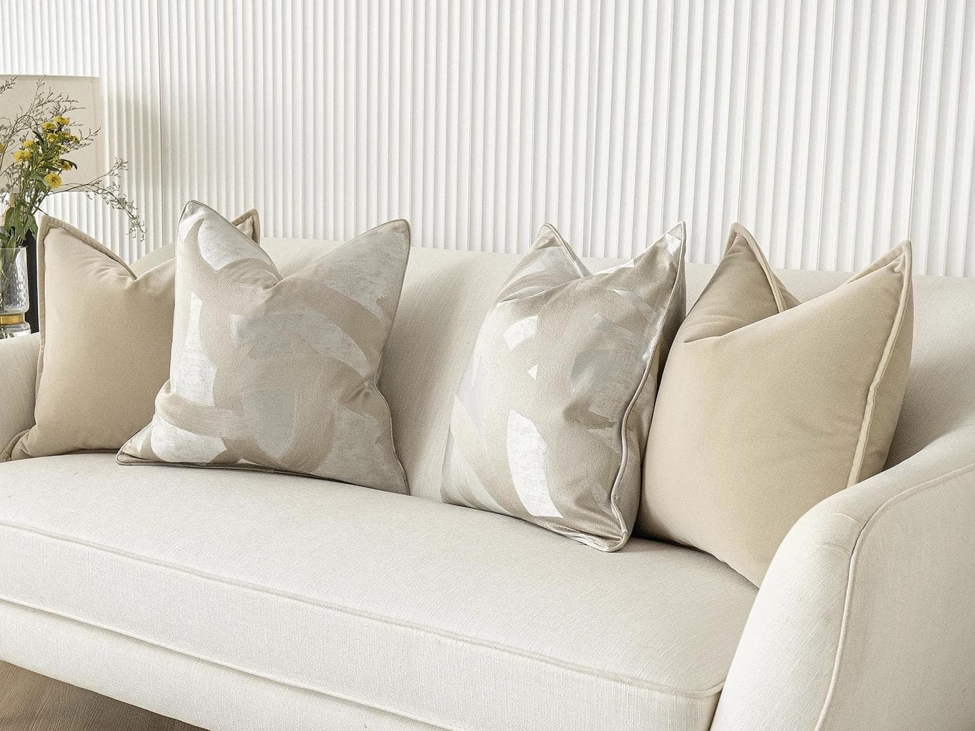 Bethyna Bundle cushion in beige and silver, shown in a lifestyle right view as image 2
