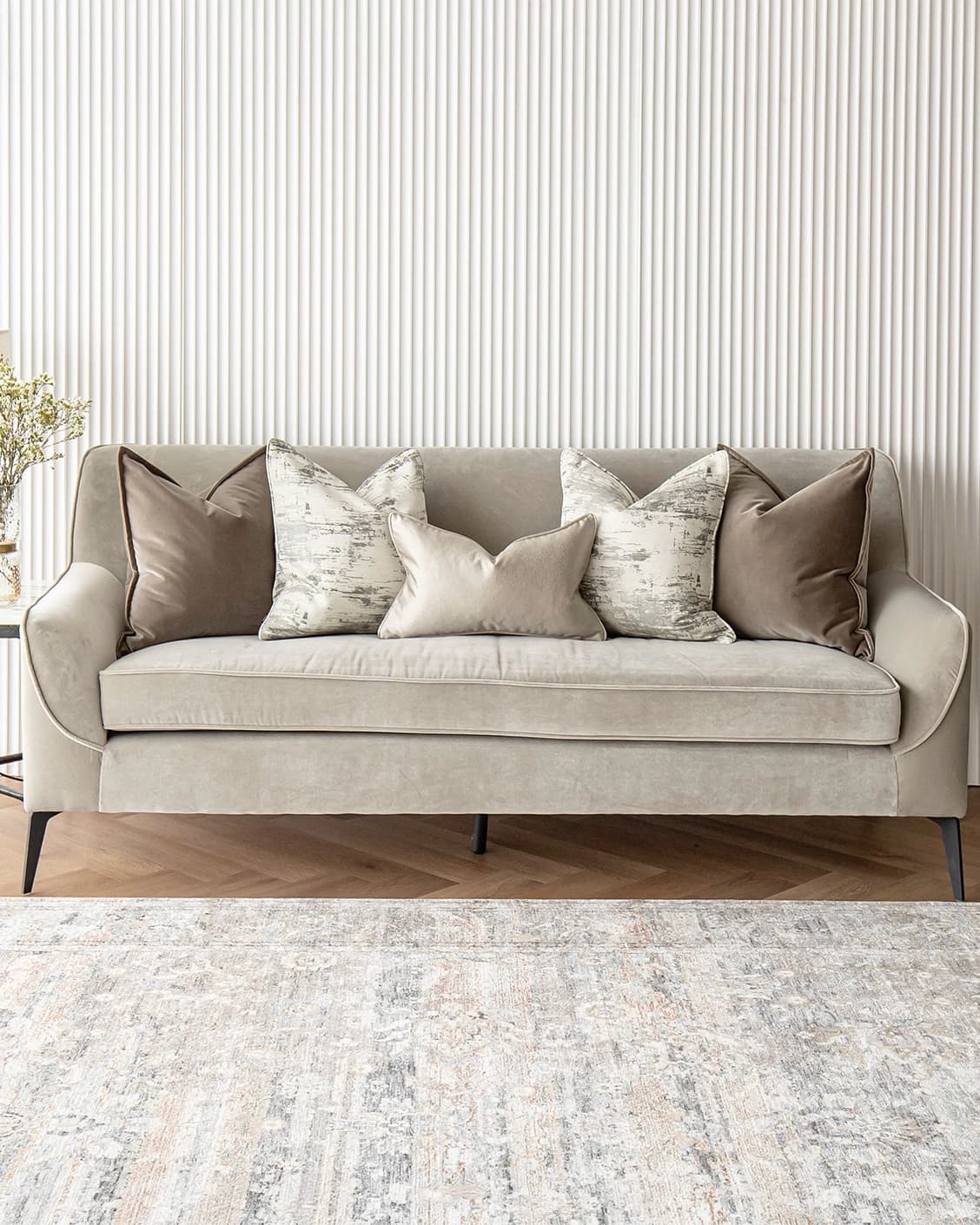Timmy Bundle cushion in gold, brown, beige, grey and white, shown in a lifestyle front view as image 4