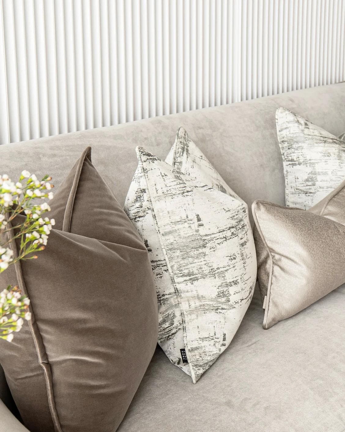 Timmy Bundle cushion in gold, brown, beige, grey and white, shown in a product left view as image 7