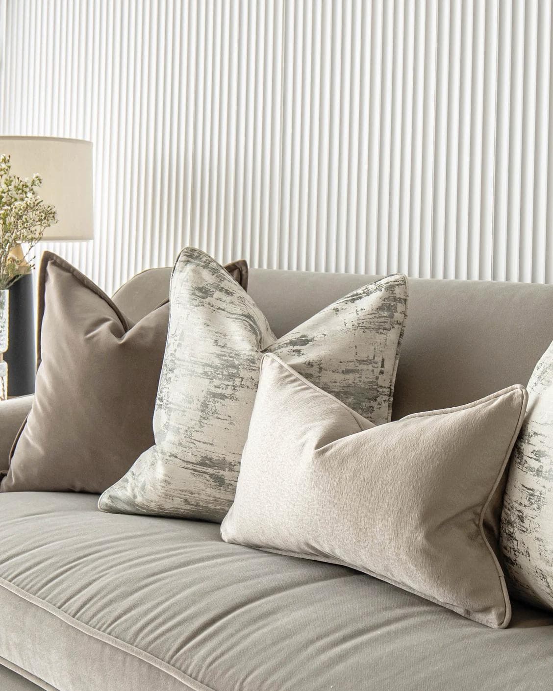 Timmy Bundle cushion in gold, brown, beige, grey and white, shown in a product right view as image 8