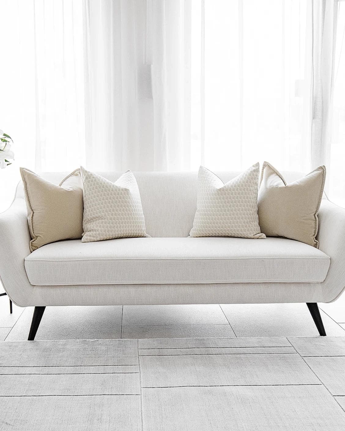 Danica Bundle cushion, shown in a lifestyle front view as image 4