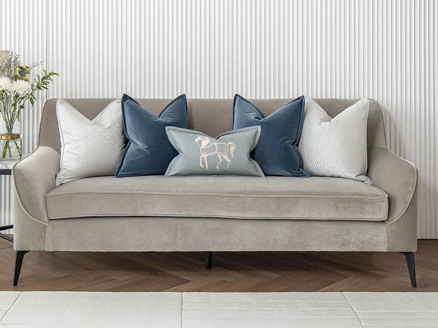 Kristal Bundle cushion in blue, silver and white, shown in a lifestyle front view as image 4