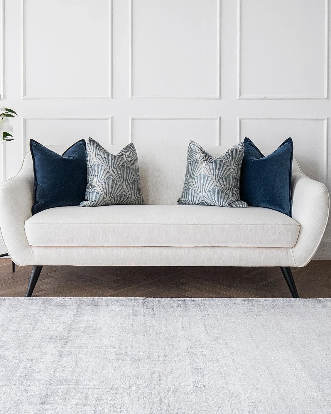 Dina Bundle cushion in royal blue, shown in a lifestyle front view as image 4