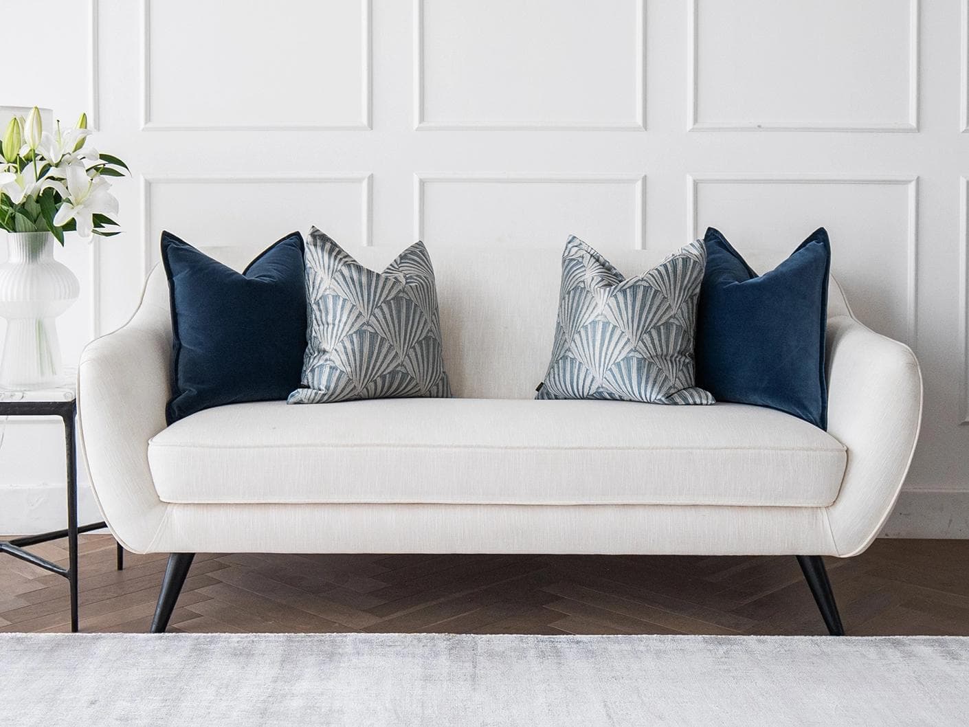 Dina Bundle cushion in royal blue, shown in a lifestyle front view as image 4