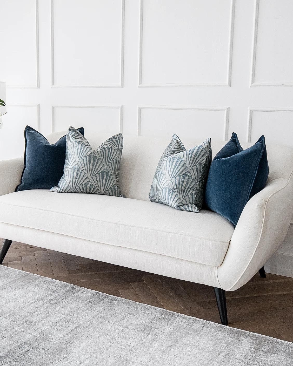 Dina Bundle cushion in royal blue, shown in a lifestyle right view as image 2