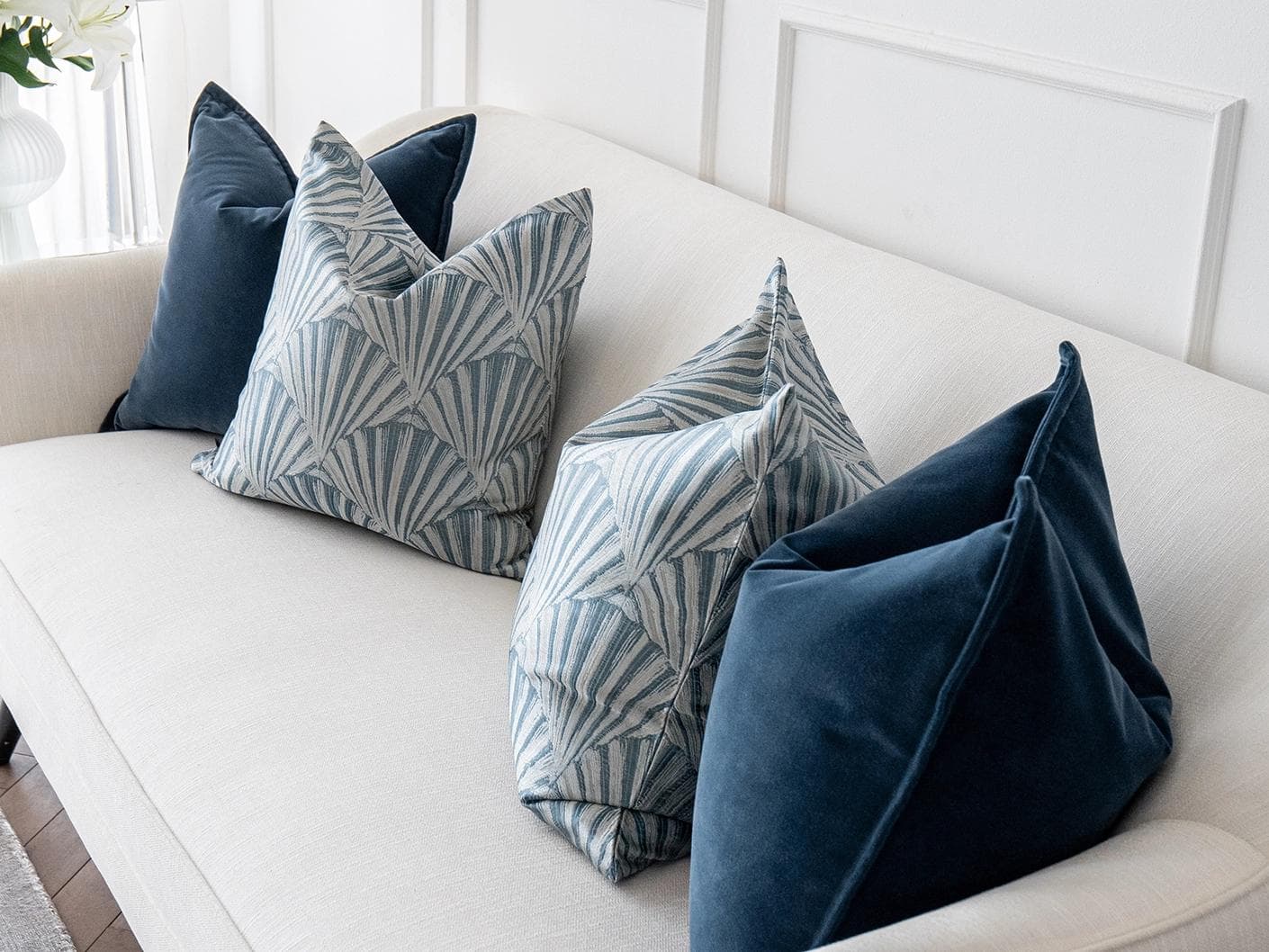 Dina Bundle cushion in royal blue, shown in a lifestyle top view as image 5