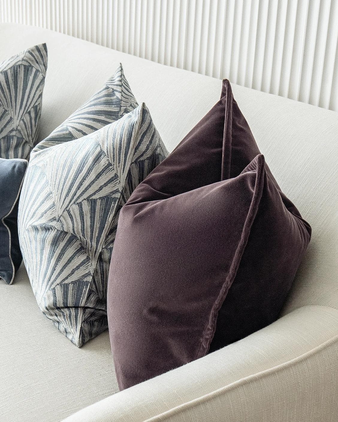 Fiavola Bundle cushion in purple, blue and silver, shown in a product right view as image 8