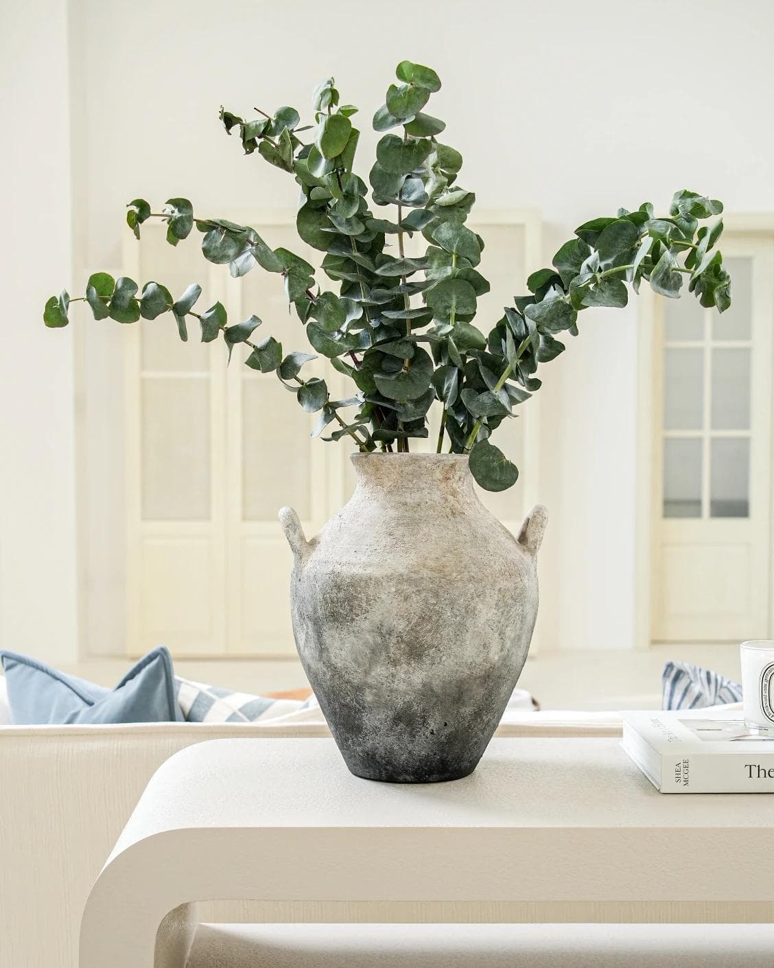 Vess Terra vases in stone and grey, shown in a lifestyle front view as image 2