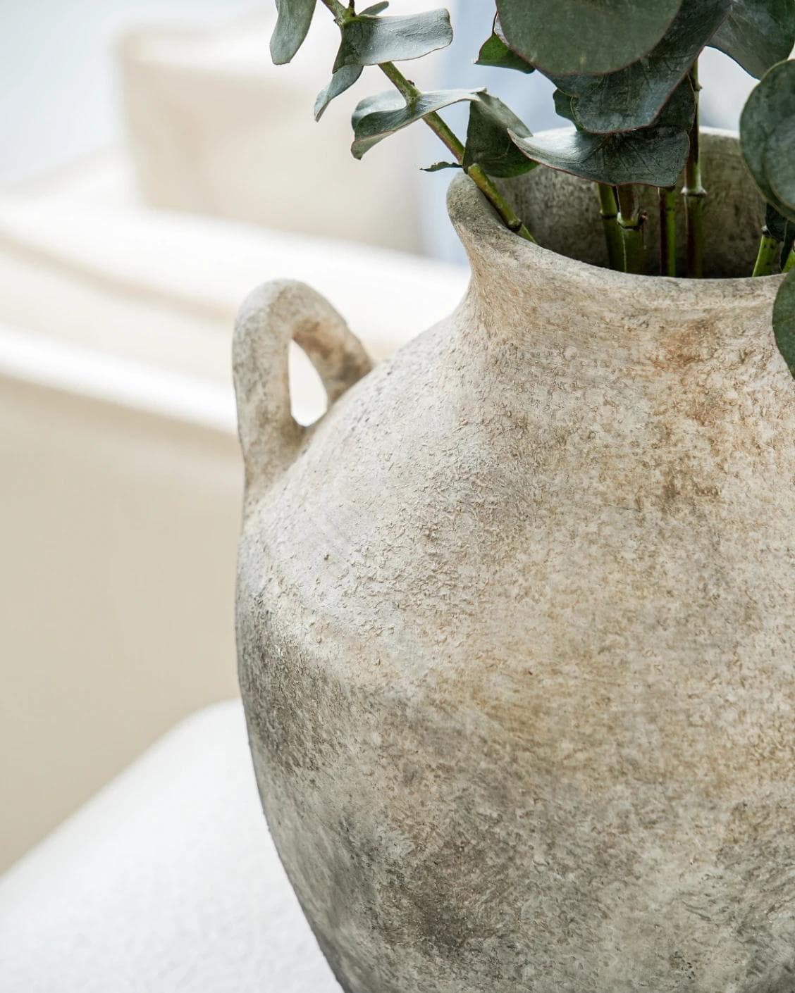 Vess Terra vases in stone and grey, shown in a lifestyle left view as image 6