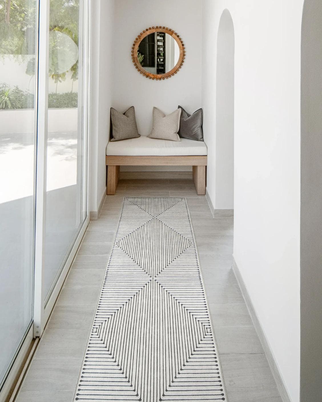 Vince Bianca Runners carpet in black and white, shown in a lifestyle front view