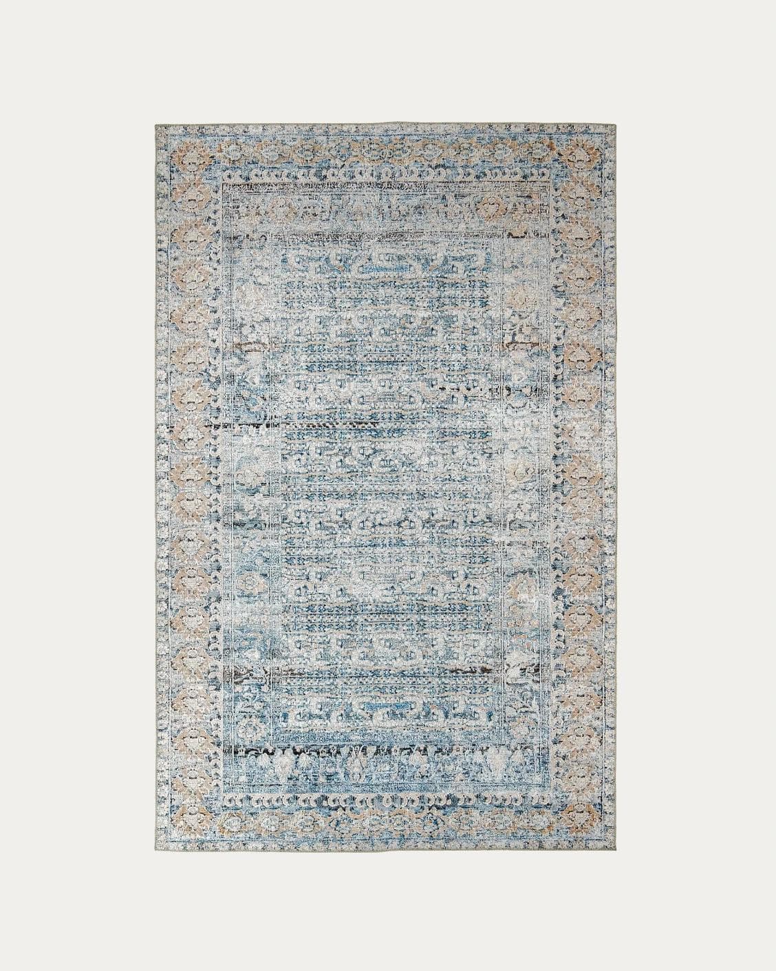 Vince Lake carpets in blue and rust, shown in a product top view as image 1