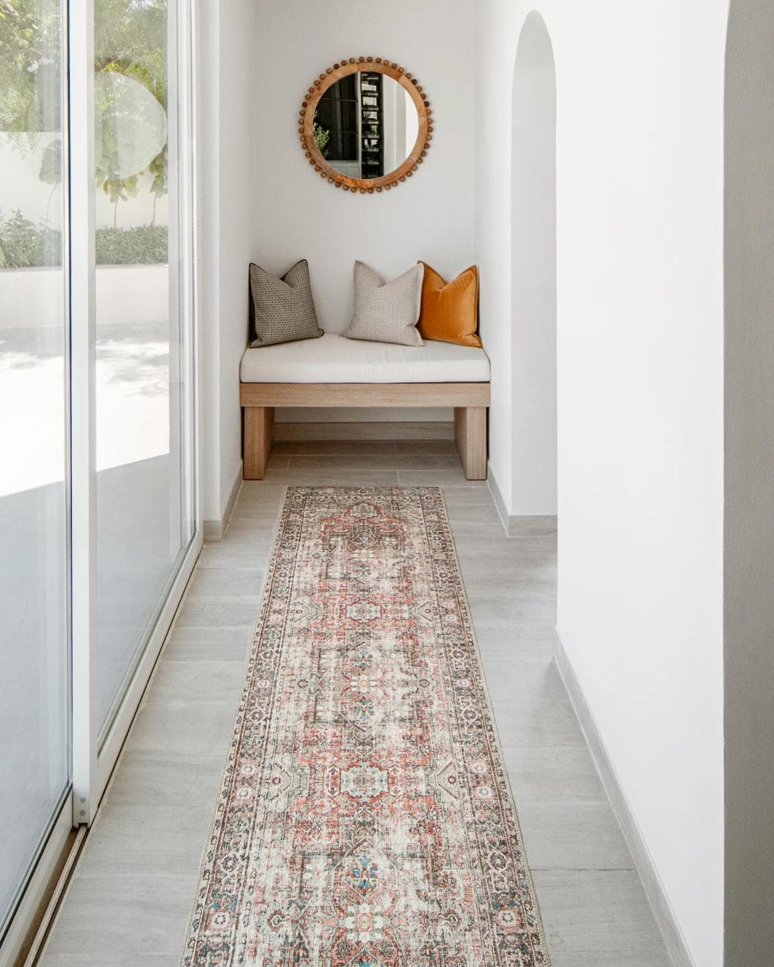 Vince Rouge Runners carpet in red and multicolour, shown in a lifestyle front view