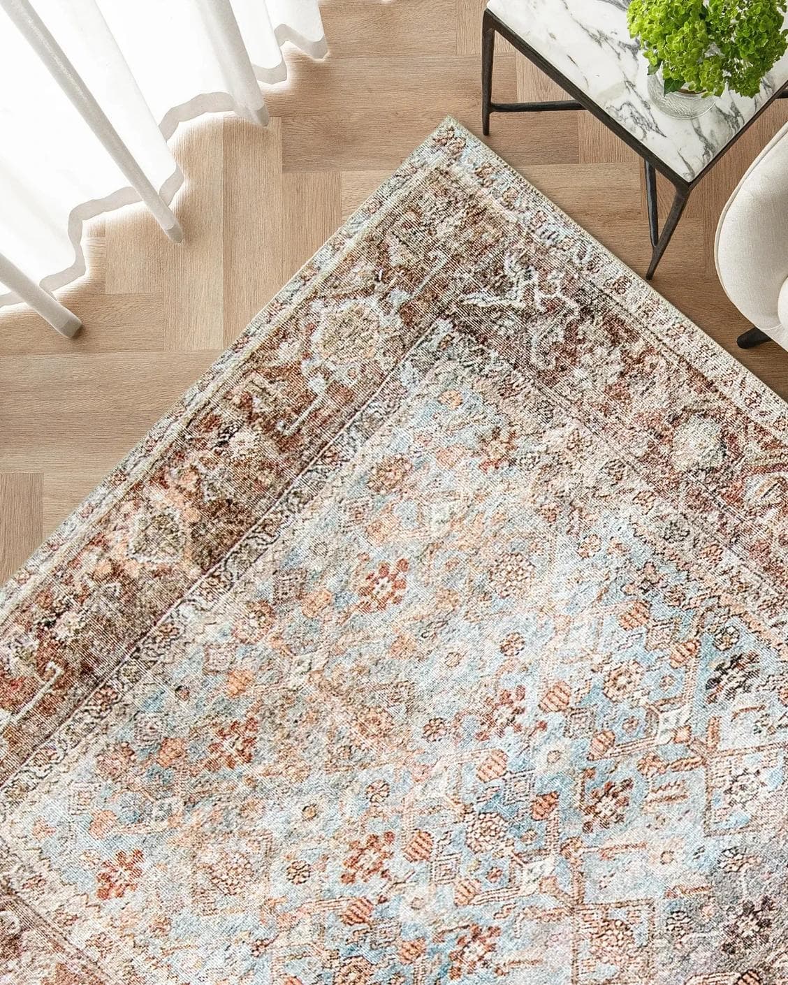 Vince Sandy carpet in beige and multicolour, shown in a lifestyle top view as image 2