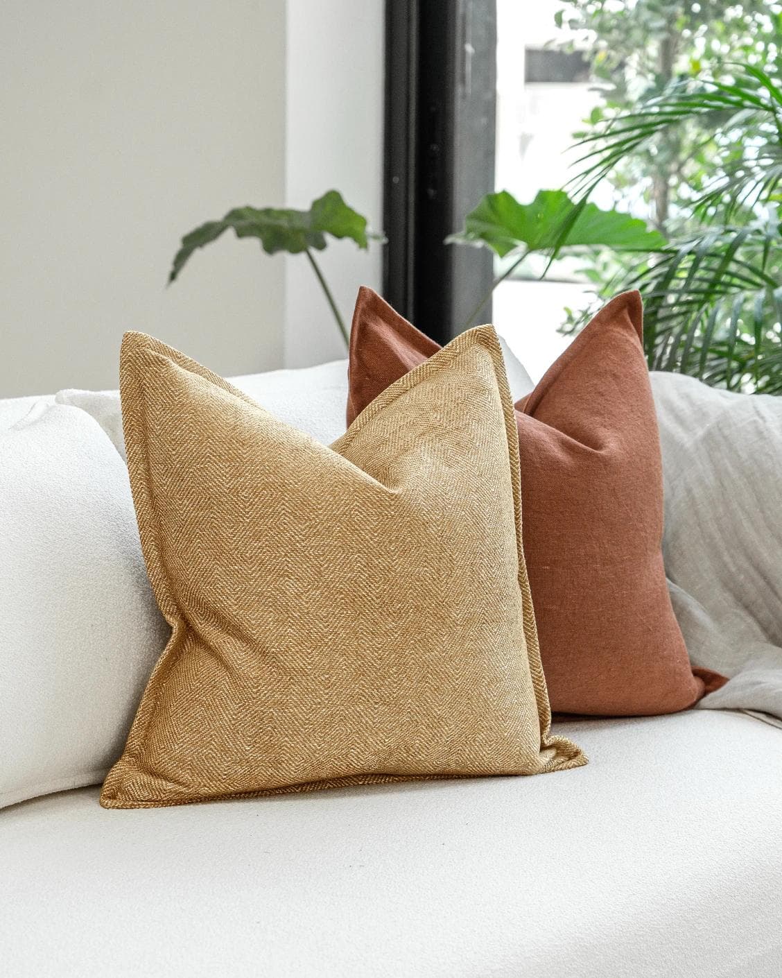 Vixi Bundle cushion in dune, brown and rust, shown in a product left view as image 5