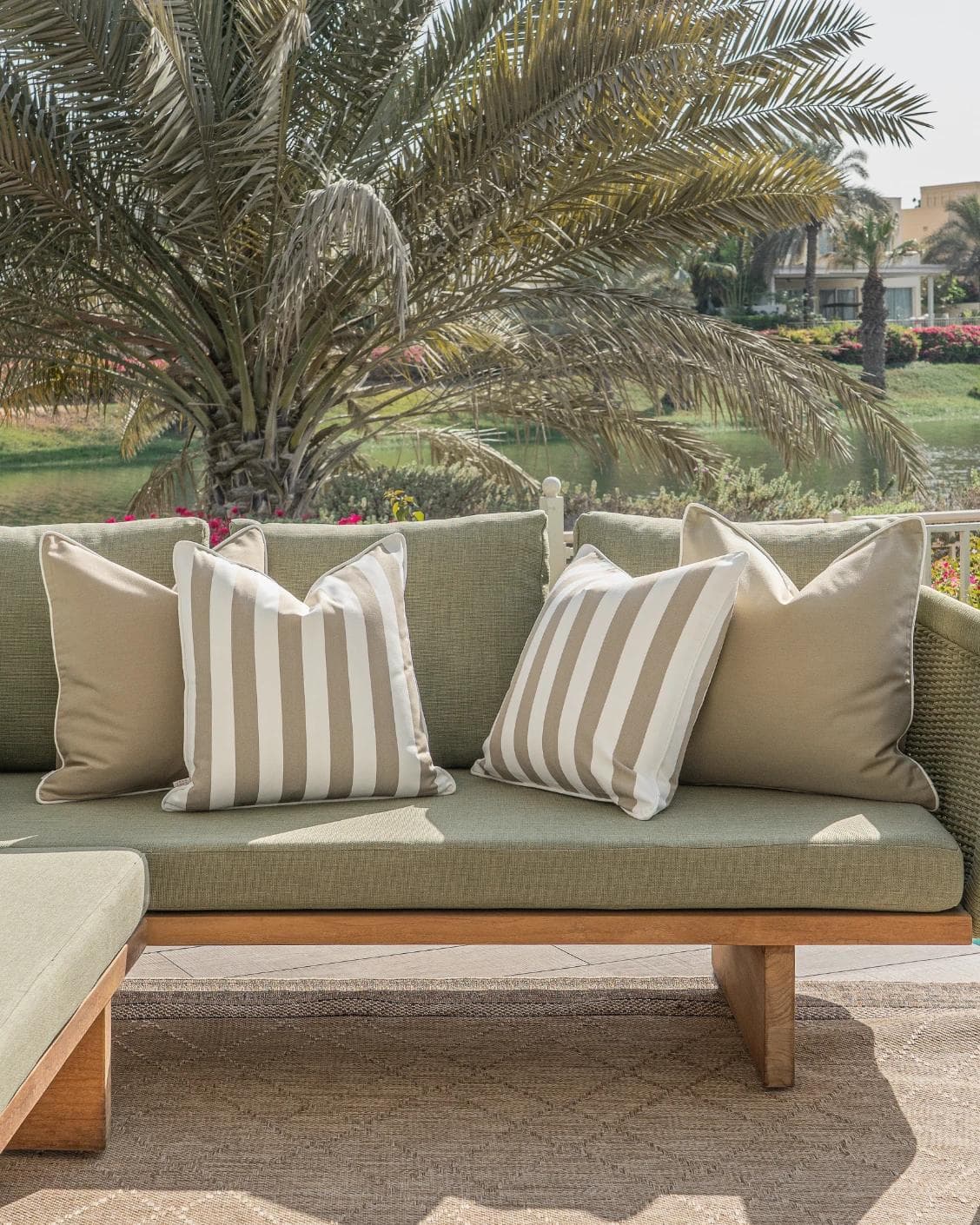 Vrithi Bundle cushion in beige, shown in a lifestyle front view as image 4