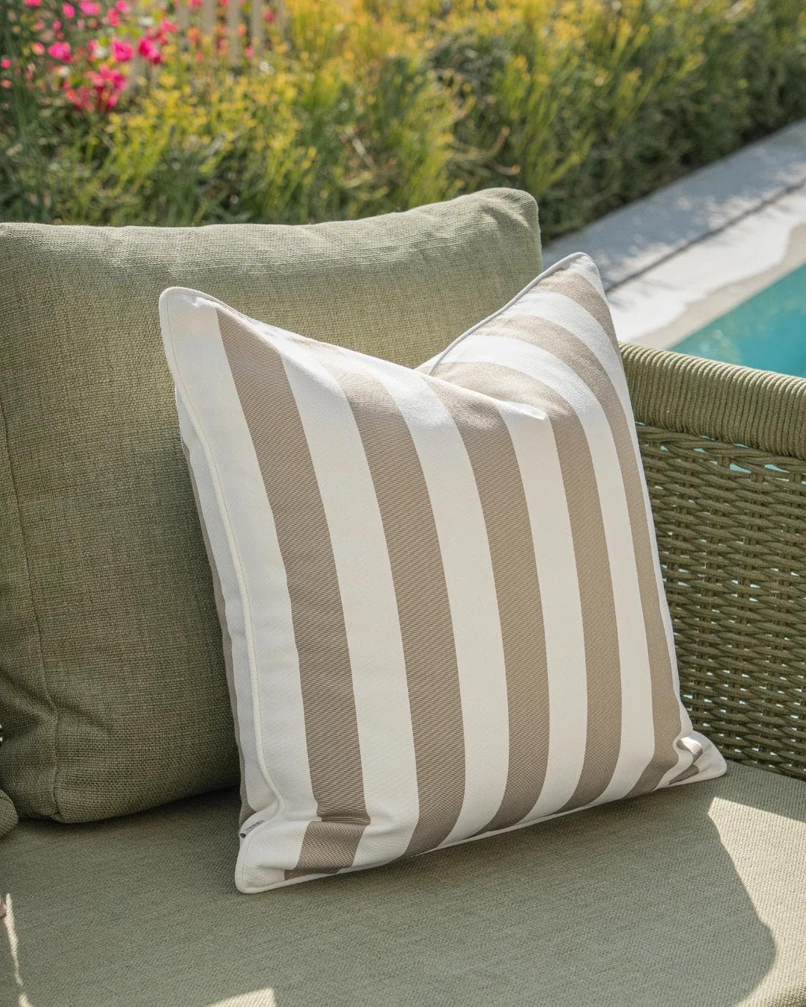 Vrithi Bundle cushion in beige, shown in a lifestyle left view as image 6