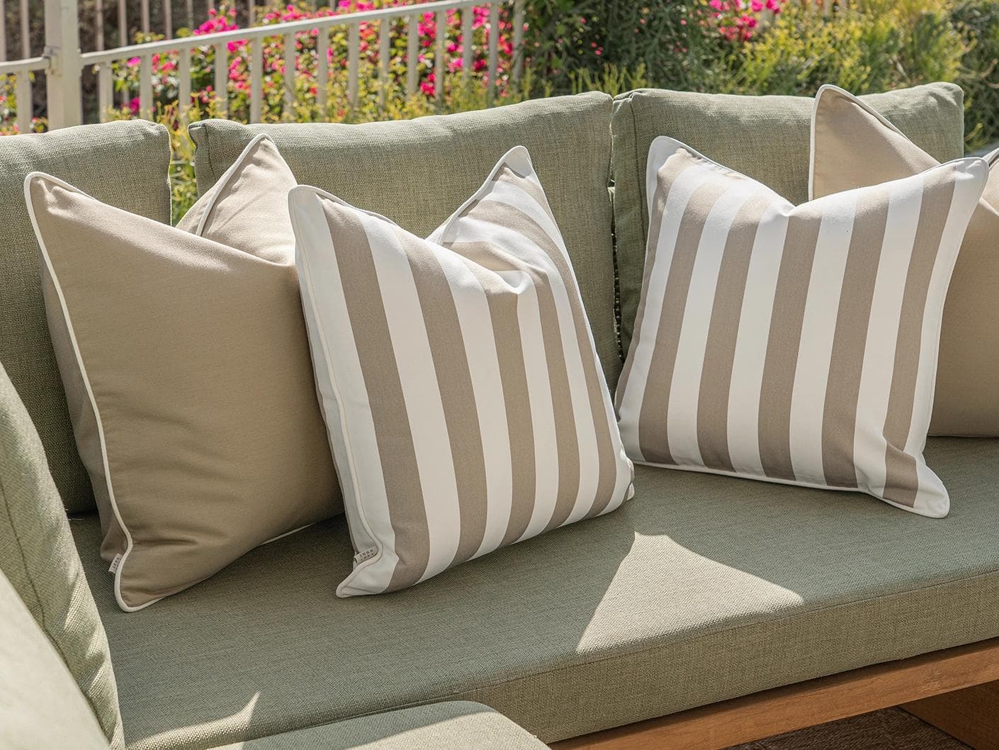 Vrithi Bundle cushion in beige, shown in a lifestyle left view as image 7