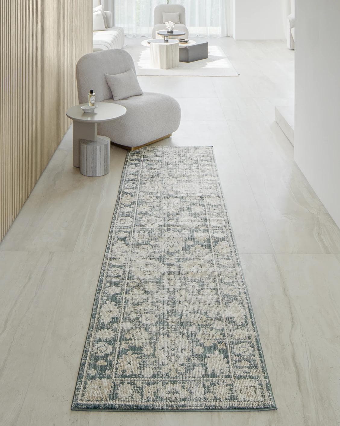 Warren Cobalt Runners carpet in blue and beige, shown in a lifestyle front view