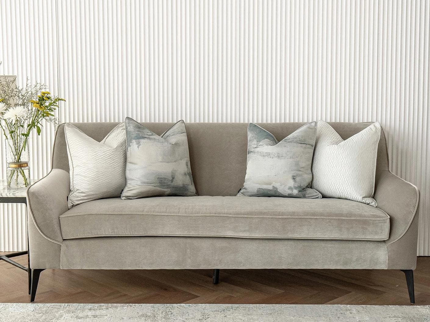 Carey Bundle cushion in blue and silver, shown in a lifestyle front view as image 4