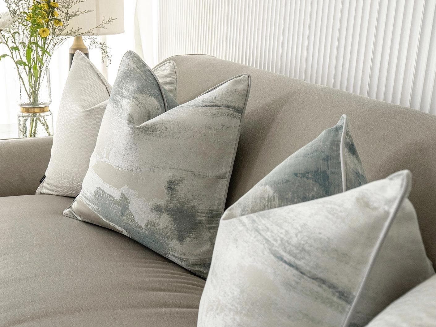 Carey Bundle cushion in blue and silver, shown in a lifestyle right view as image 6