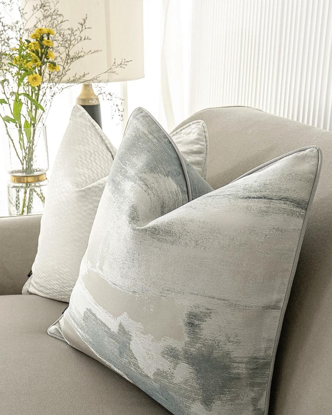 Carey Bundle cushion in blue and silver, shown in a lifestyle right view as image 7