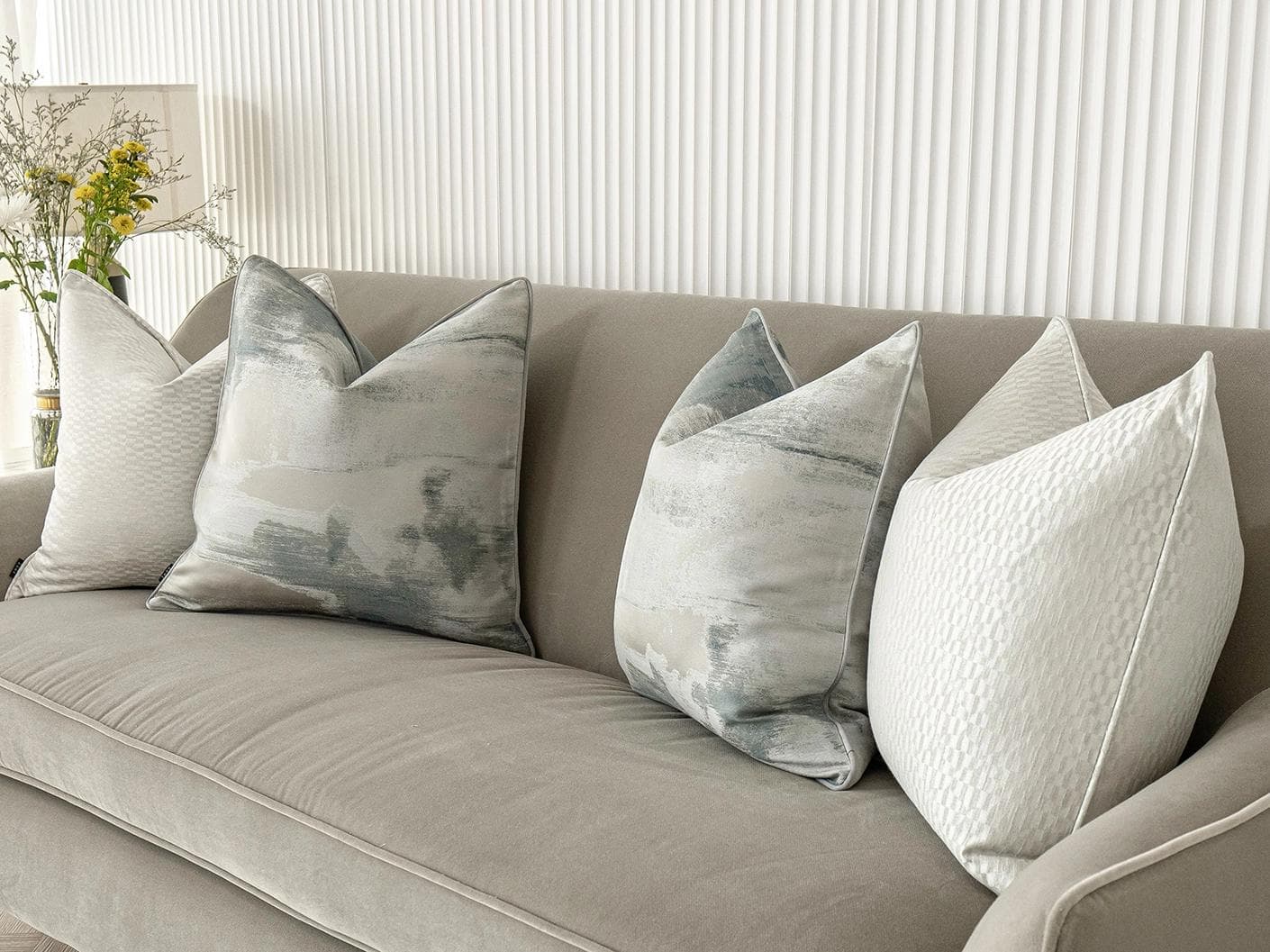 Carey Bundle cushion in blue and silver, shown in a lifestyle right view as image 2
