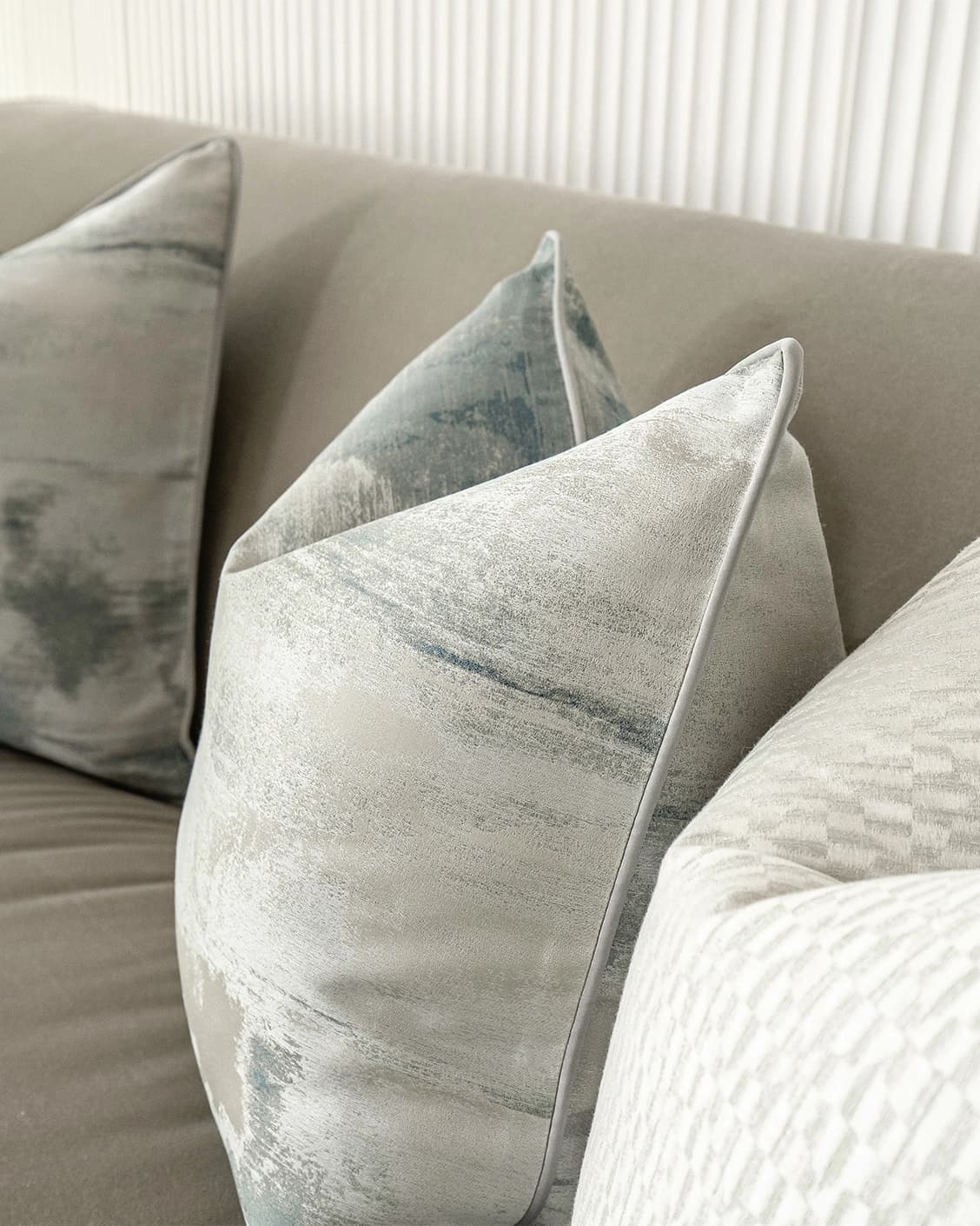 Carey Bundle cushion in blue and silver, shown in a product close-up front view as image 8