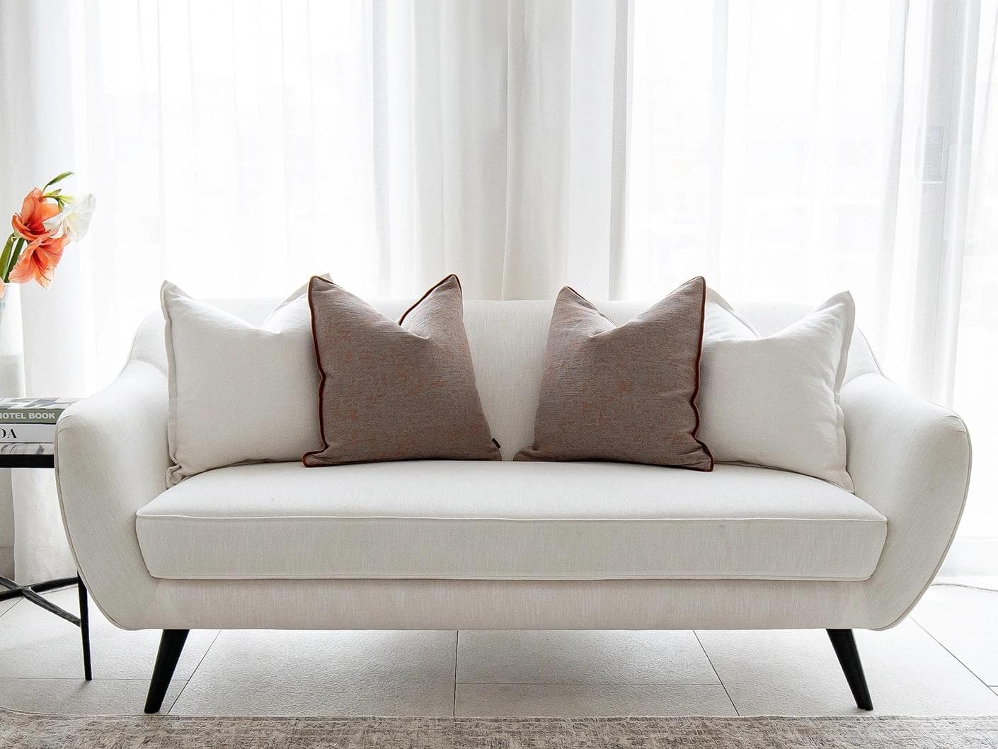 Eloise Bundle bundle - indoor in white and orange, shown in a lifestyle front view as image 1