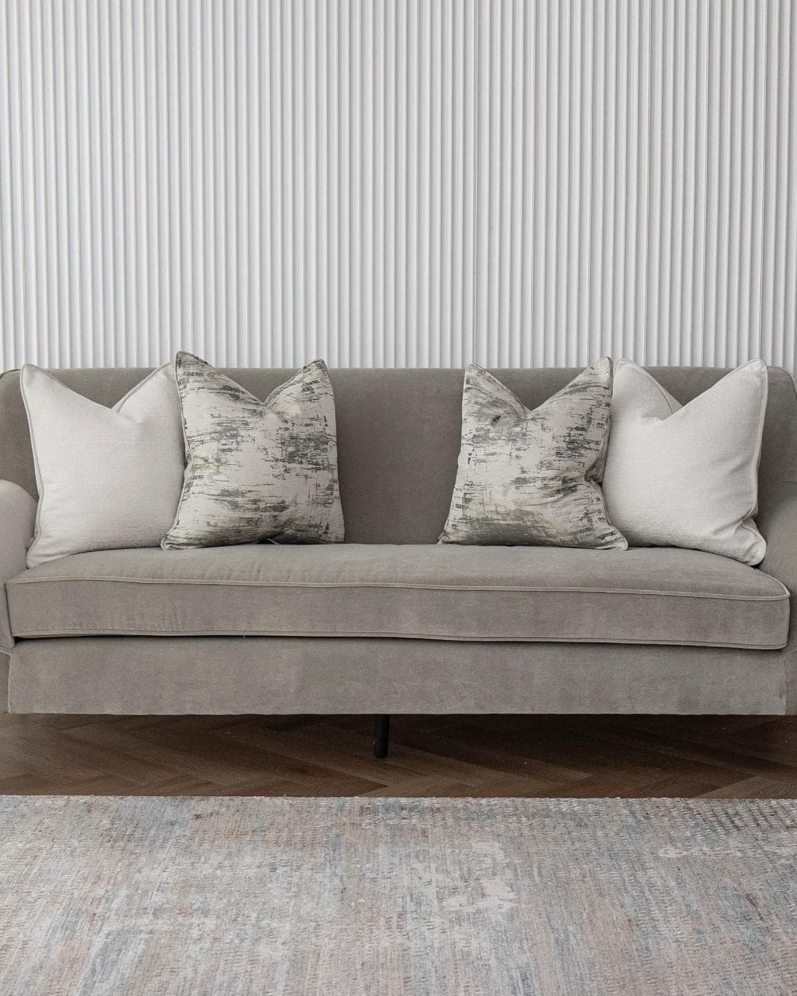 Indira Bundle cushion in white, shown in a lifestyle front view as image 4