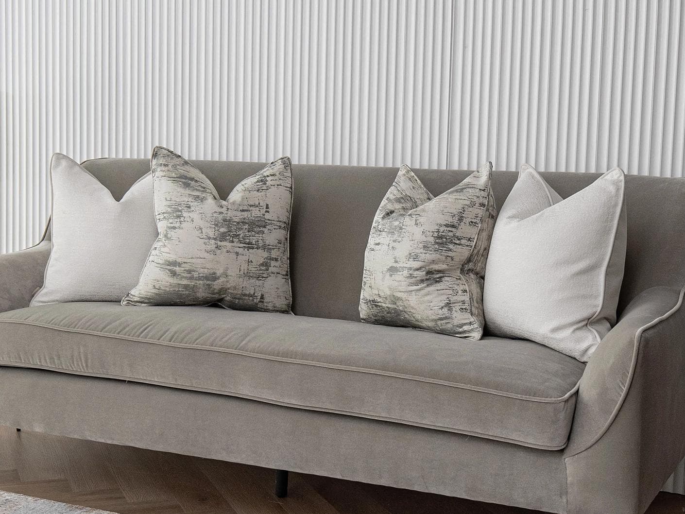 Indira Bundle cushion in white, shown in a lifestyle right view as image 2