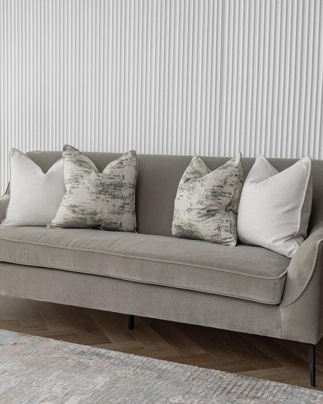 Indira Bundle cushion in white, shown in a lifestyle right view as image 2