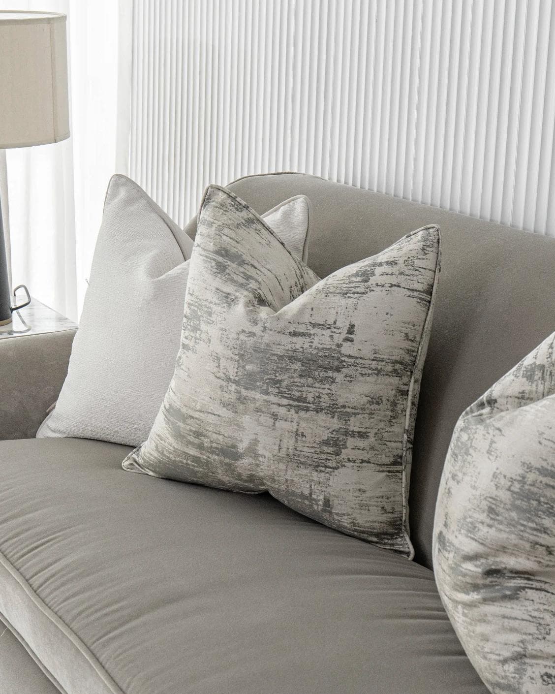 Indira Bundle cushion in white, shown in a product right view as image 5